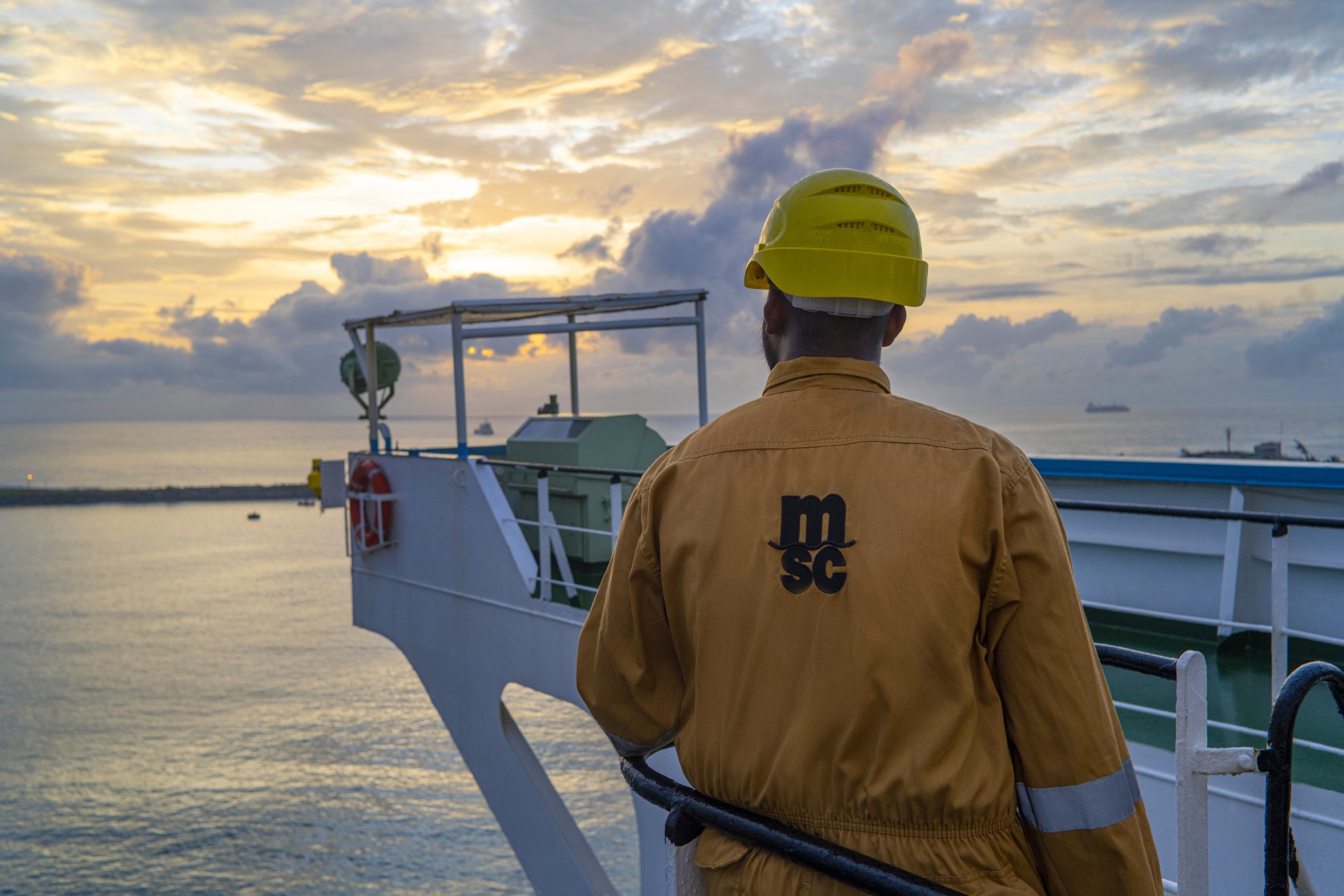 MSC Crew member onboard looking at a beautiful sunset